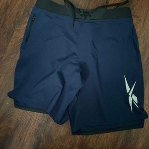 Bundle of 8 pair of Reebok shorts all size Medium